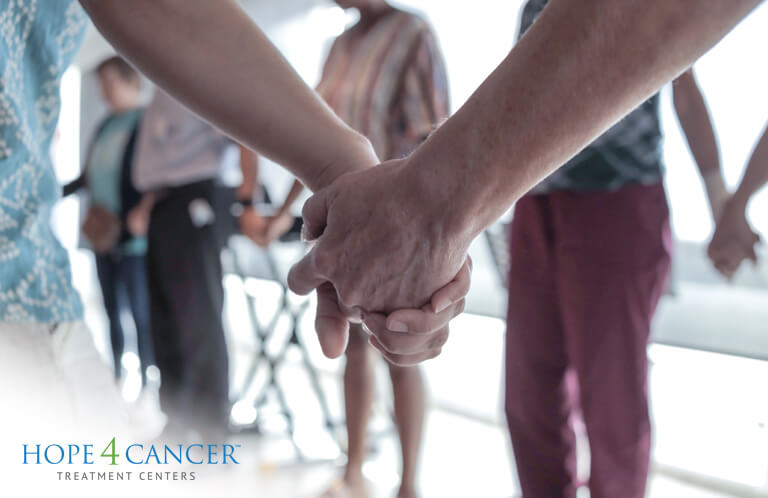 Patients holding hands